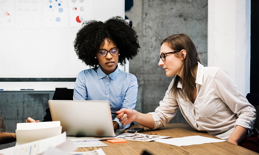 hr specialists reviewing employee information