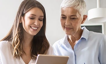 two people reviewing state retirement savings