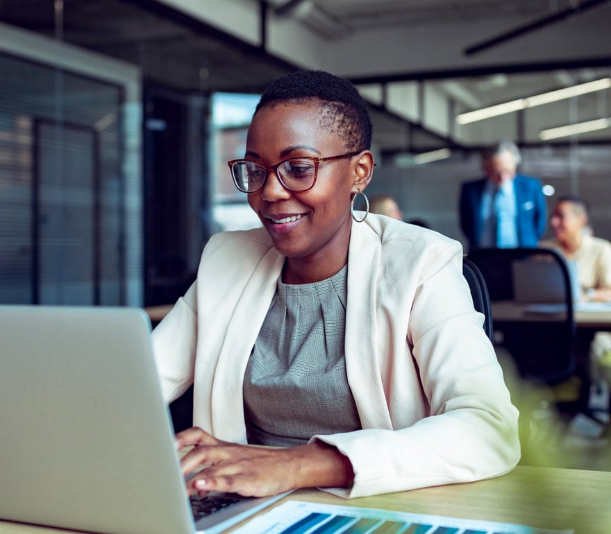 A business person working on her computer