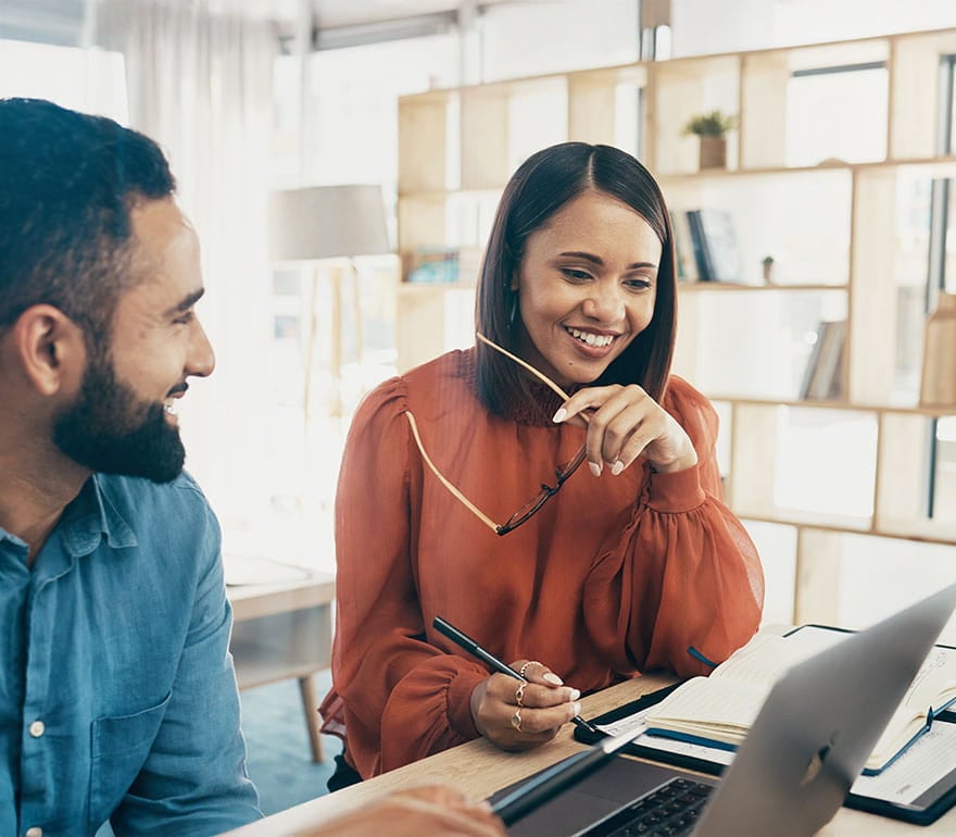 A Paychex HR Consultant going over a plan to help retain employees