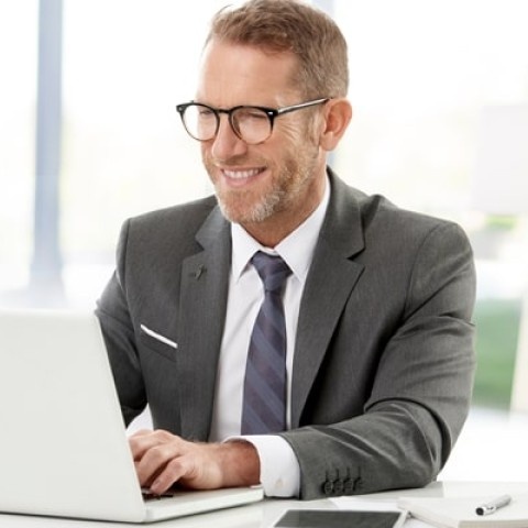 manager reviewing year-end compliance